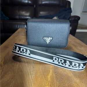 Black Crossbody Bag with Guitar Strap. No Brand.